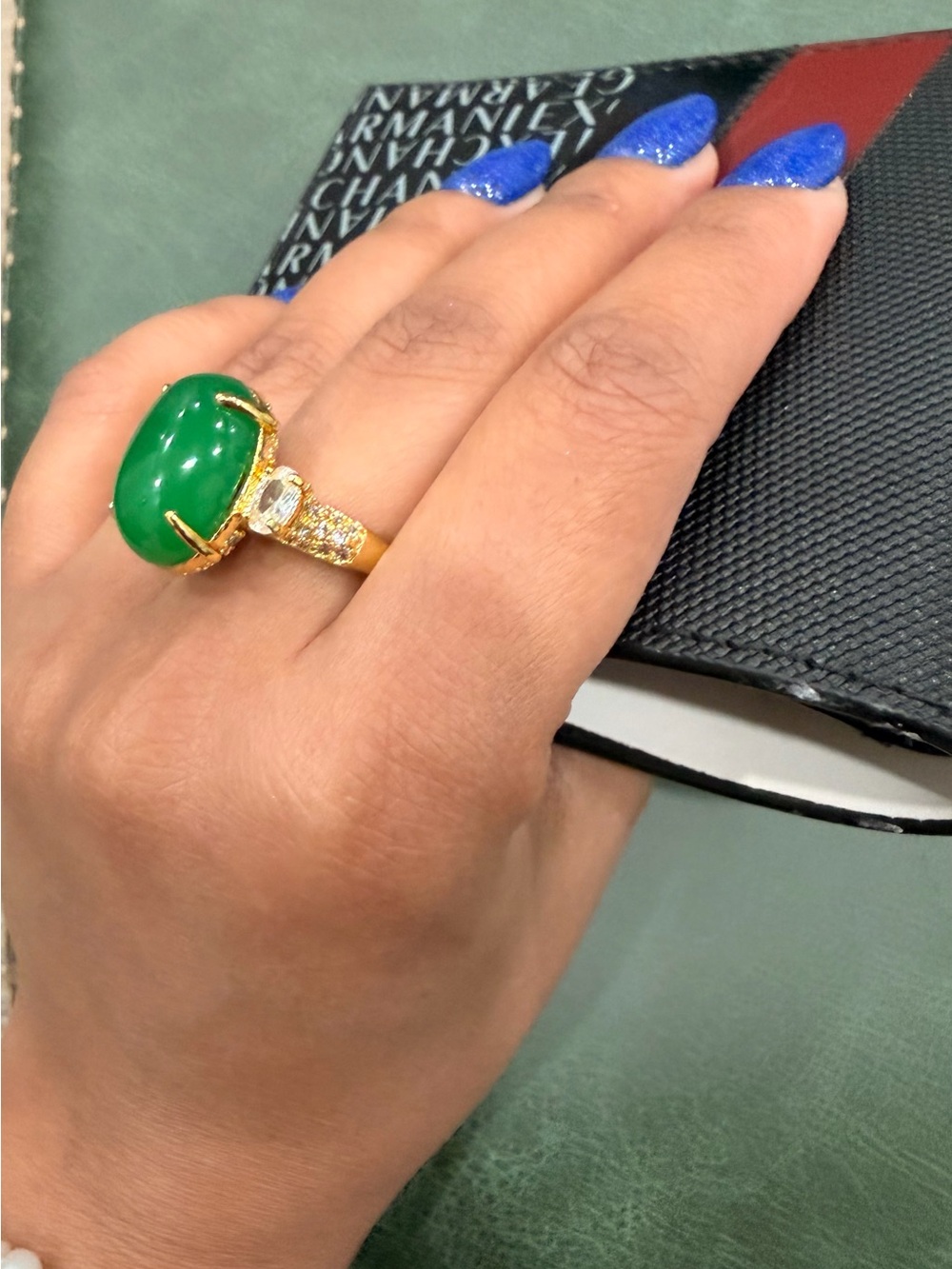 Gold-Plated Ring with Green Cabochon and Clear Accent Stones